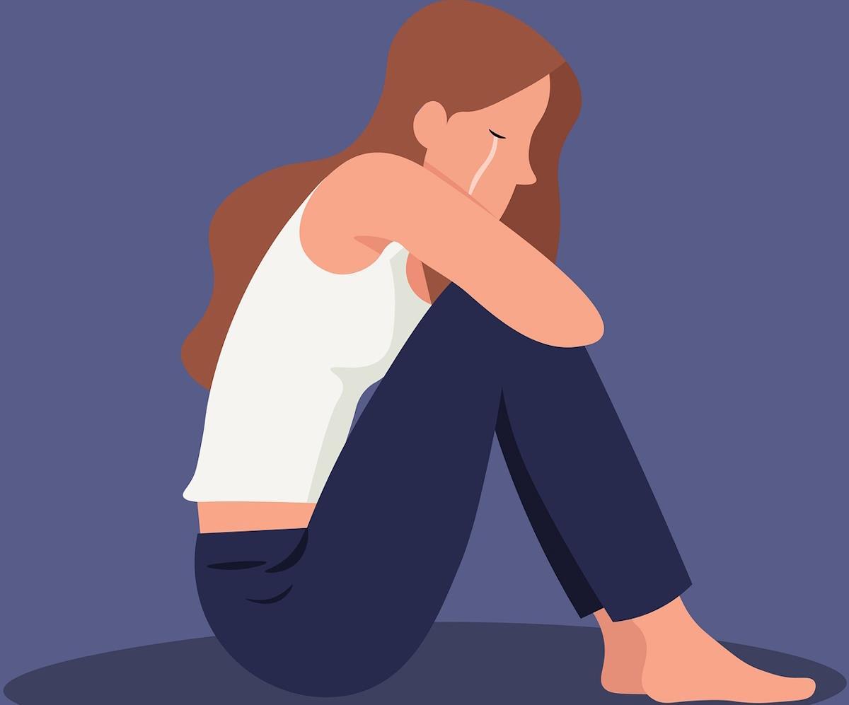 Illustrasjon av en kvinne som sitter og gråter - Klikk for stort bilde